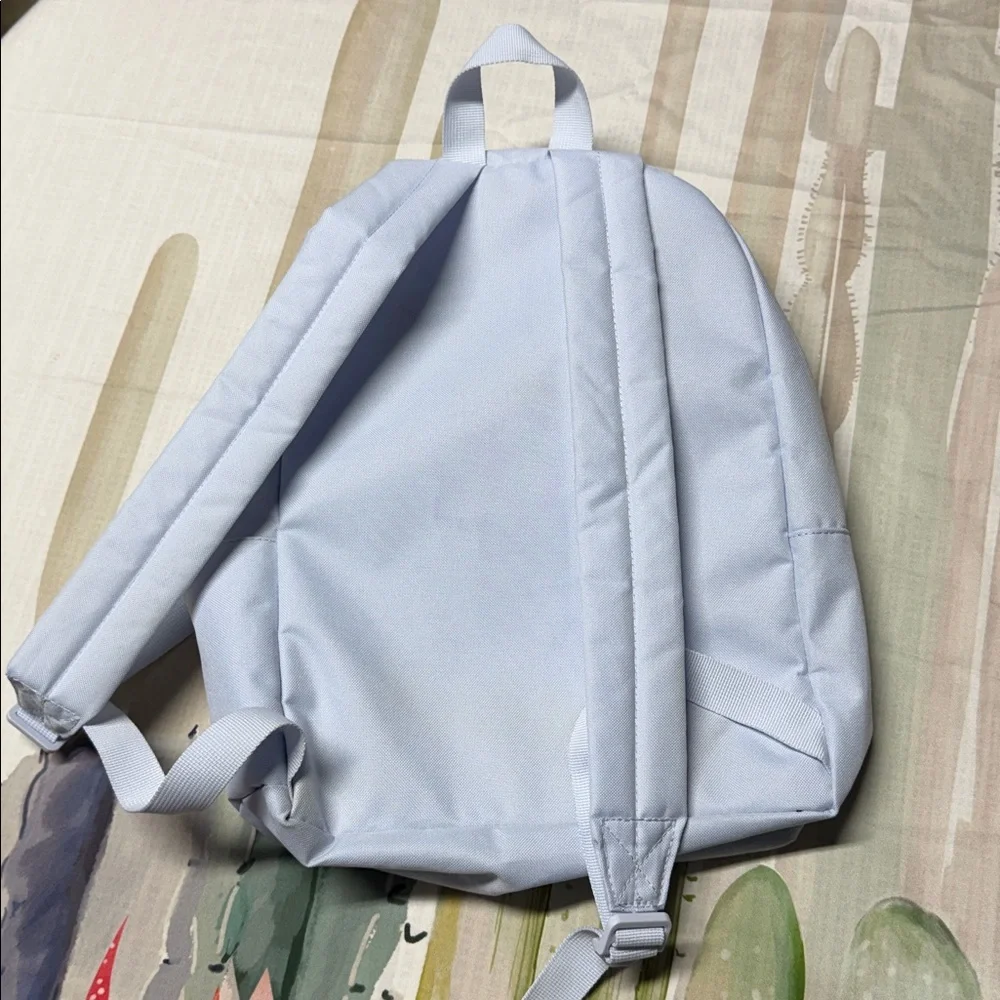 Nike Classic Kids' Backpack in Football Grey with a University Blue Bright logo